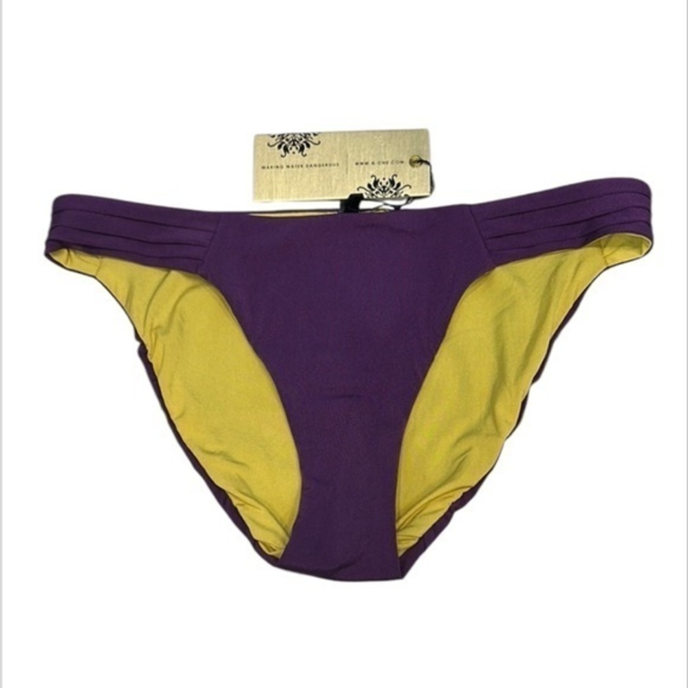 A. Che reversible swim bikini bottom Purple yellow size small
